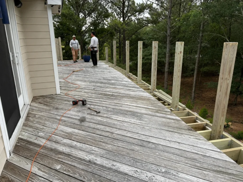 Corolla NC deck builder outer banks deck rebuild with new railing posts by Curtis Bros Contracting