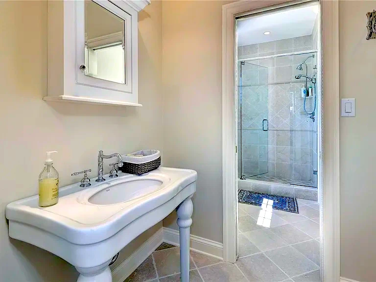 Bathroom tile and flooring remodel with clean finishes for a Chesapeake, VA home