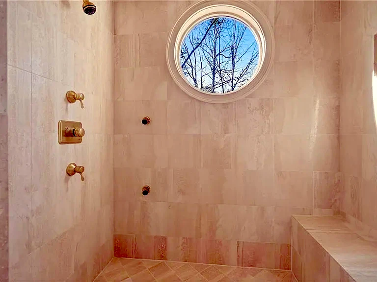 Walk-in shower remodel with tile walls, modern fixtures, and clean bathroom finishes in Midlothian, VA