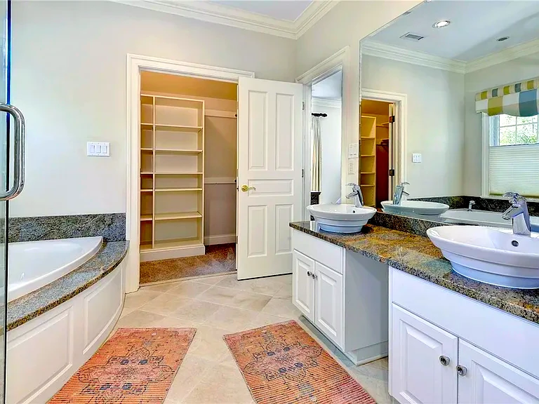 Primary and guest bathroom remodel with vanity, shower, tile, and updated finishes for a Yorktown, VA home